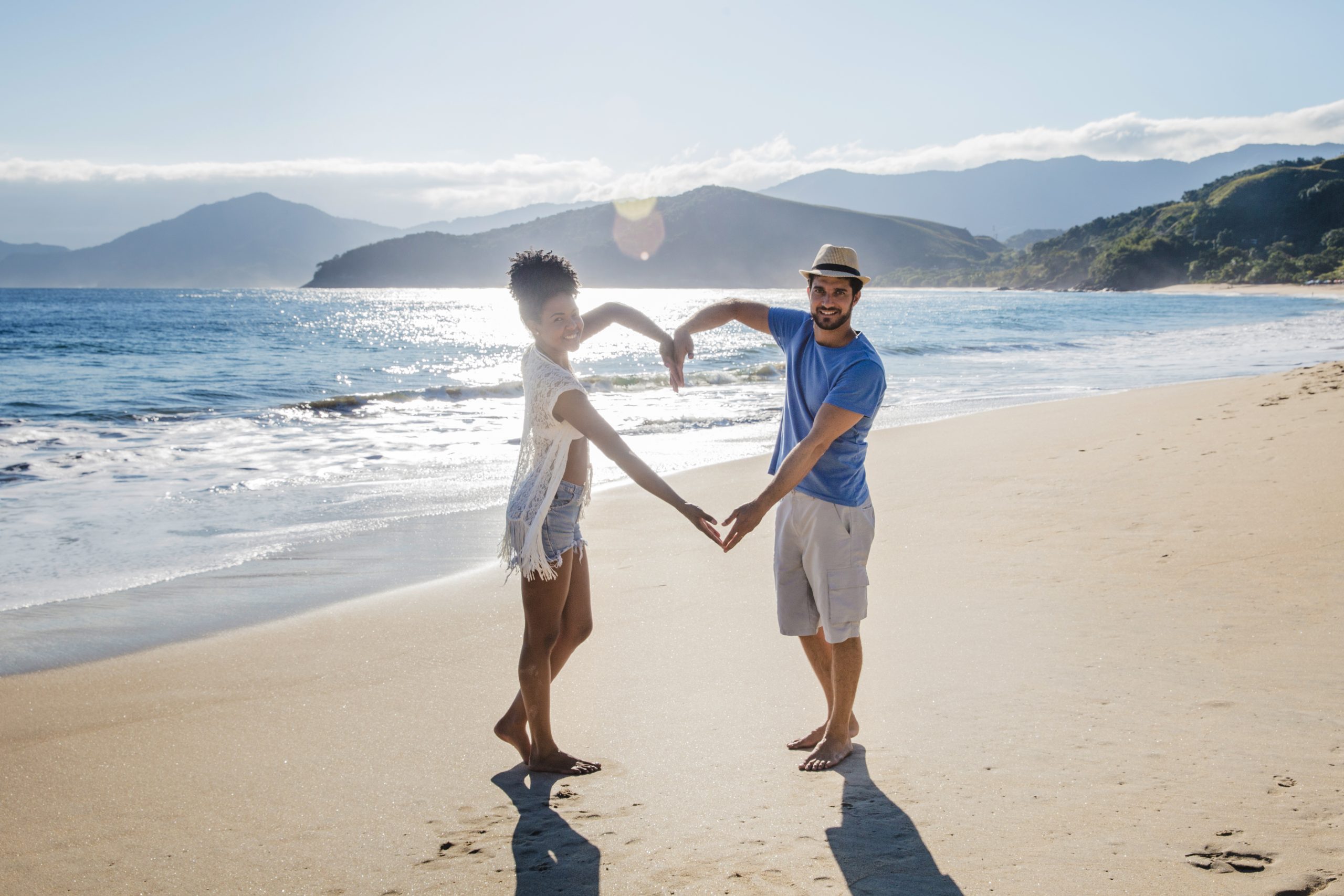 Romantic couple at beach sunset